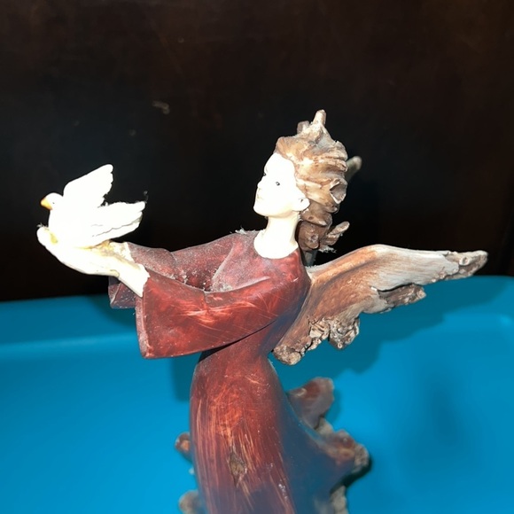 Christmas angel holding turtle dove looks like she’s part of a tree holiday deco - Picture 4 of 7